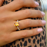 Anello con topazio arancione